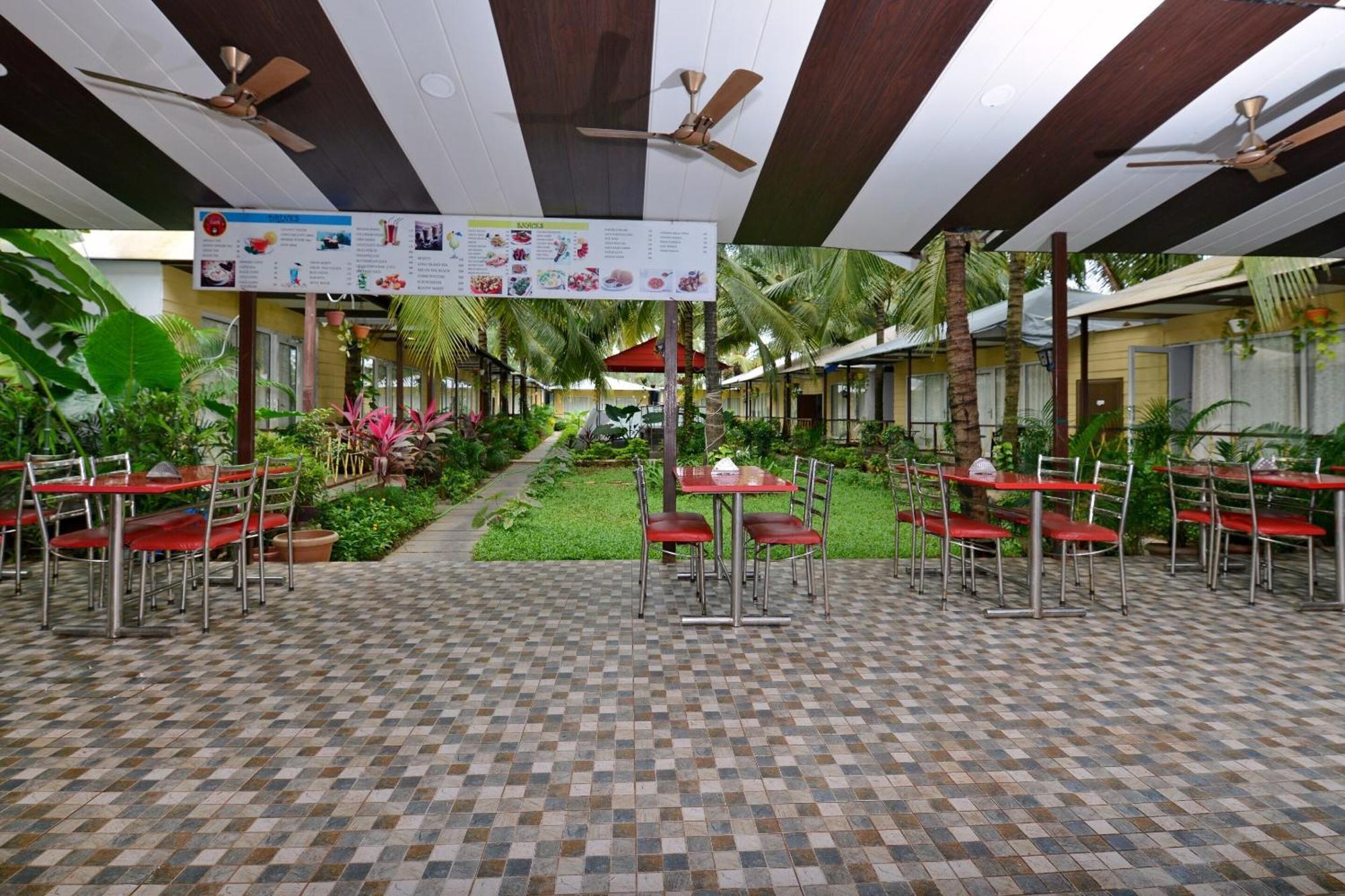 Collection O Retreat Morjim Resort Extérieur photo