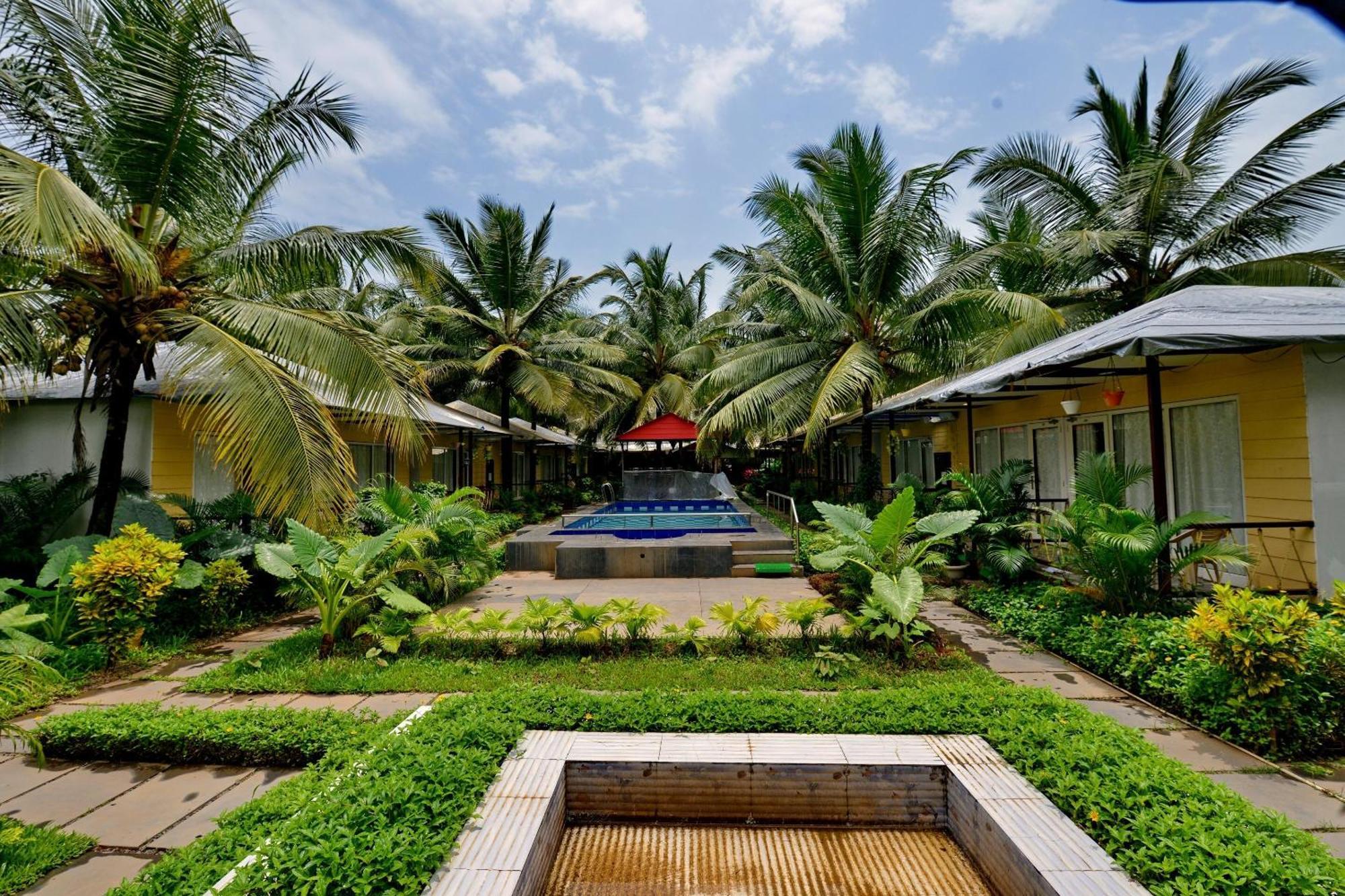 Collection O Retreat Morjim Resort Extérieur photo